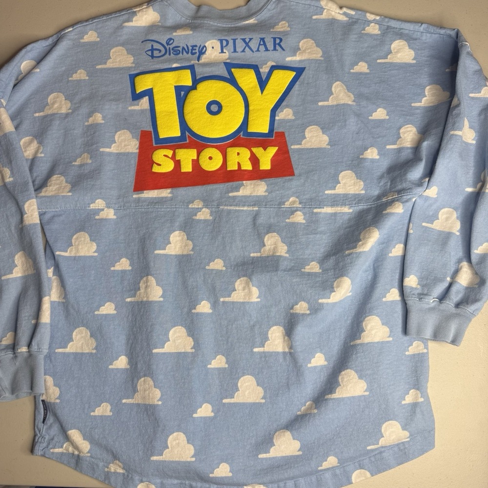 Disney Parks Spirit Jersey Pixar Toy Story Logo Clouds Puff Adult Unisex Size M